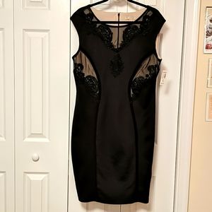 Bodycon dress with nude insets and lace detail